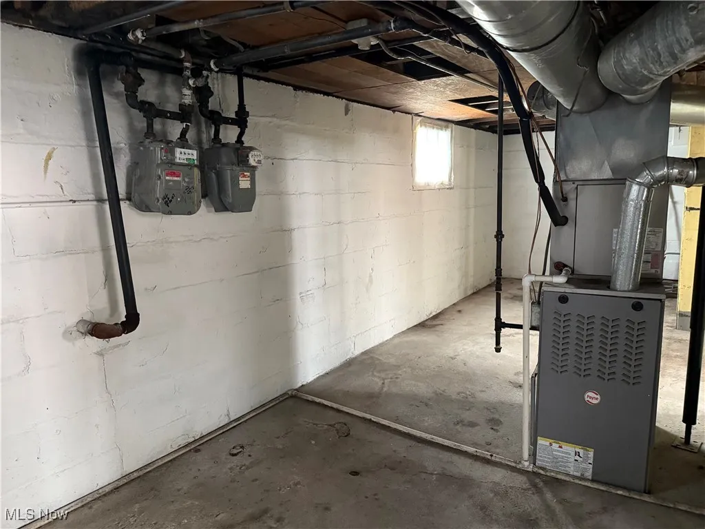 Basement with gas meter and heating unit
