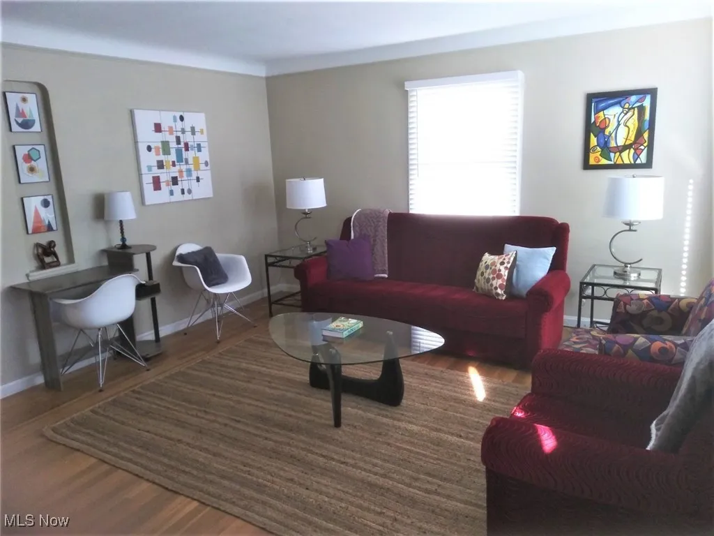 Living room featuring wood finished floors