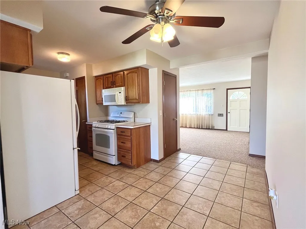 Eat in Kitchen with ceramic tile flooring