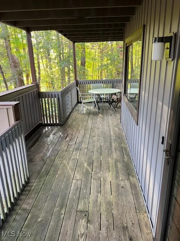 Wooden deck with outdoor dining space