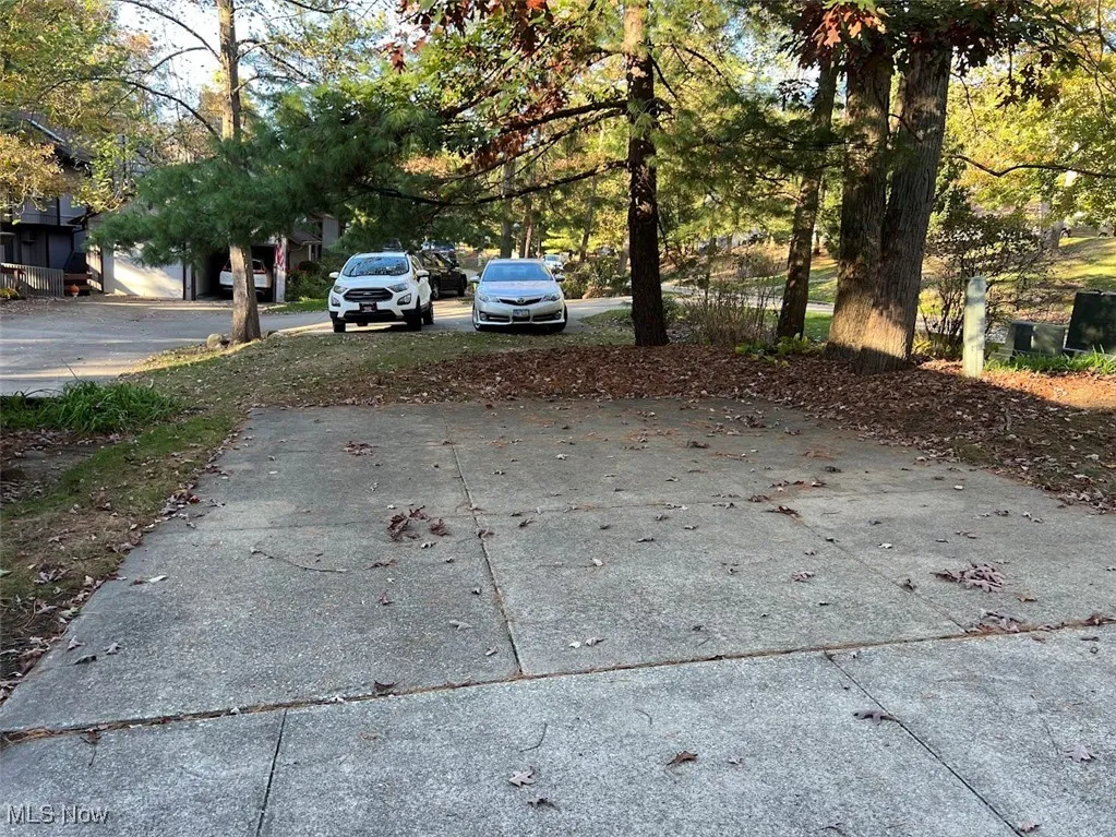 View of driveway and parking