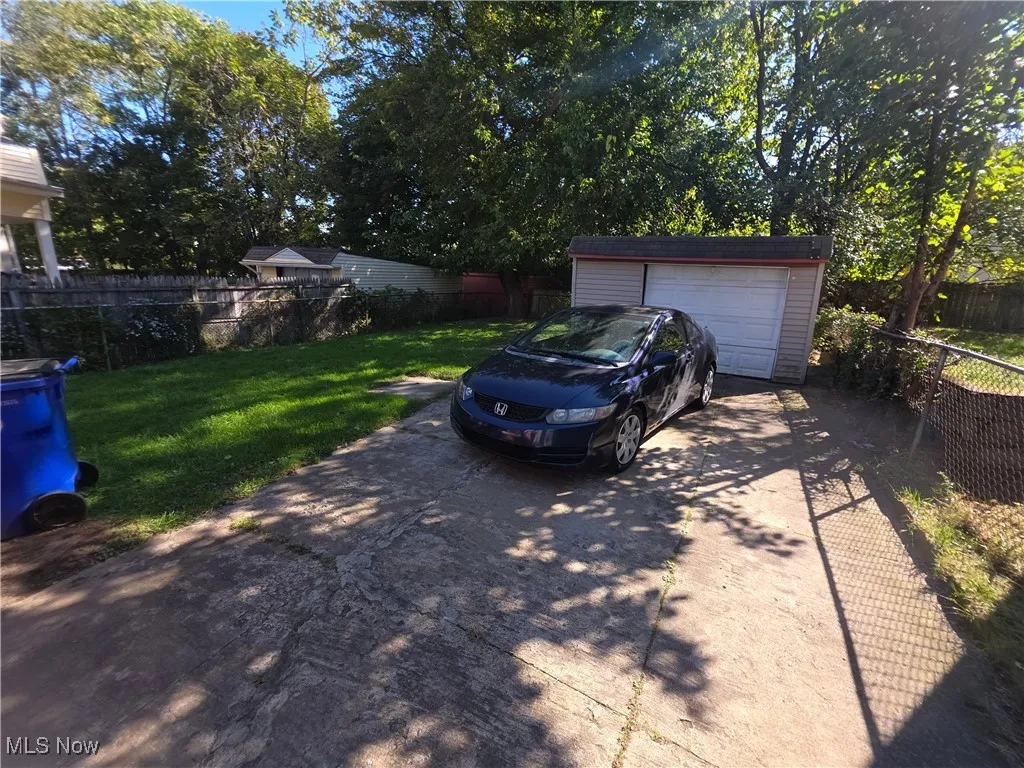 Detached garage and rear fenced in yard