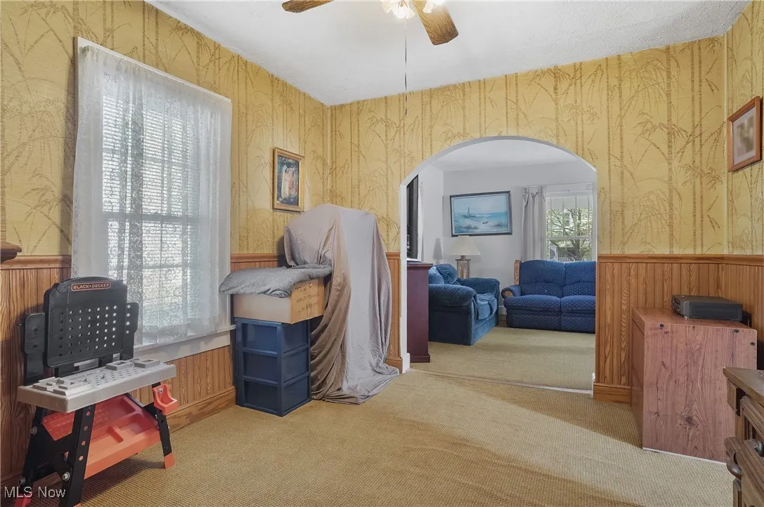 View from the first floor bedroom, looking into the dining room, toward the living room.