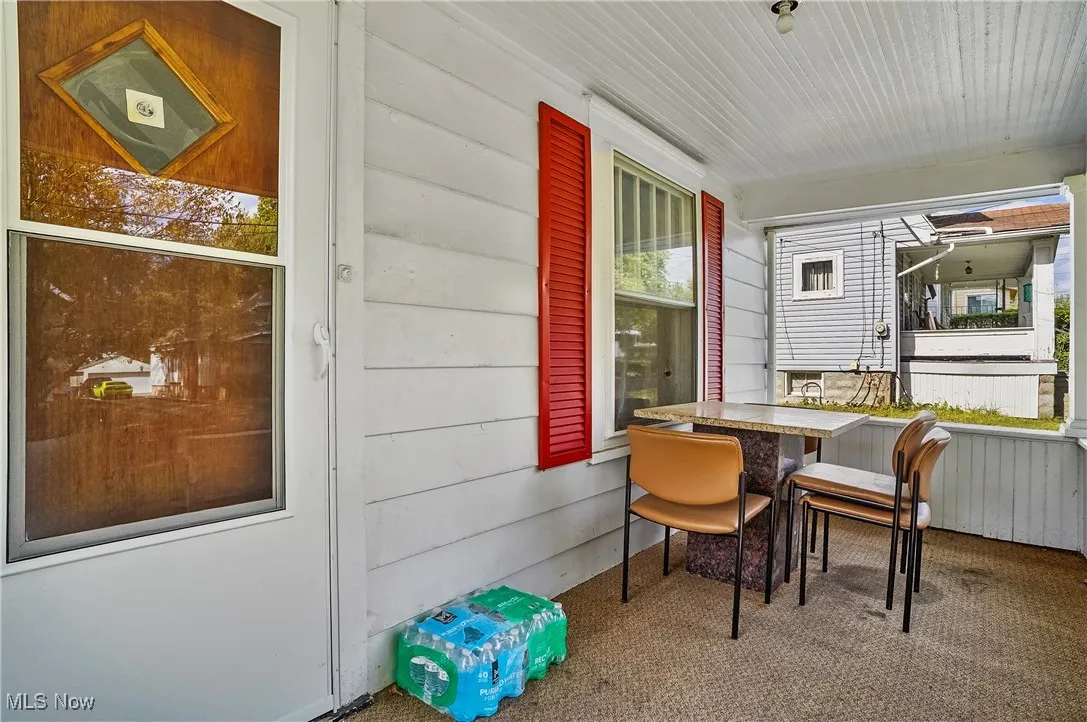 Front Porch with room for a table and chairs or a swing.
