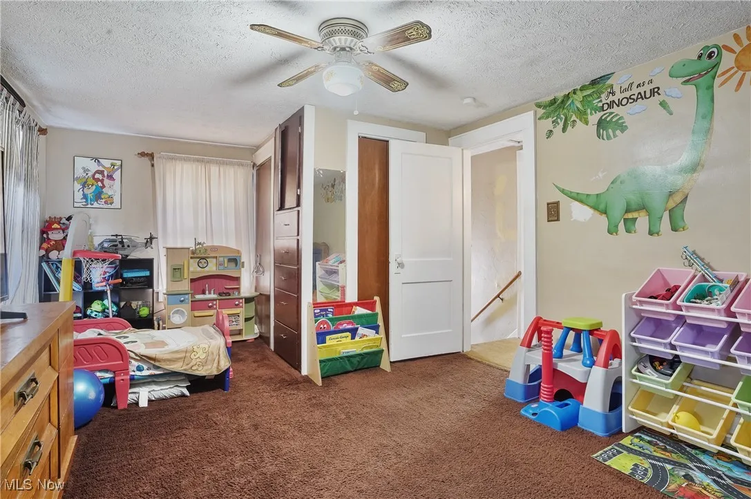 Another view of the large bedroom on 2nd floor, with 2 closets and built-ins.