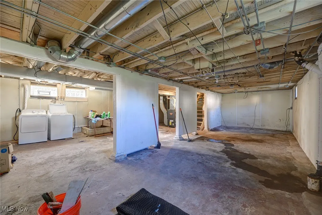 Basement featuring washer and dryer