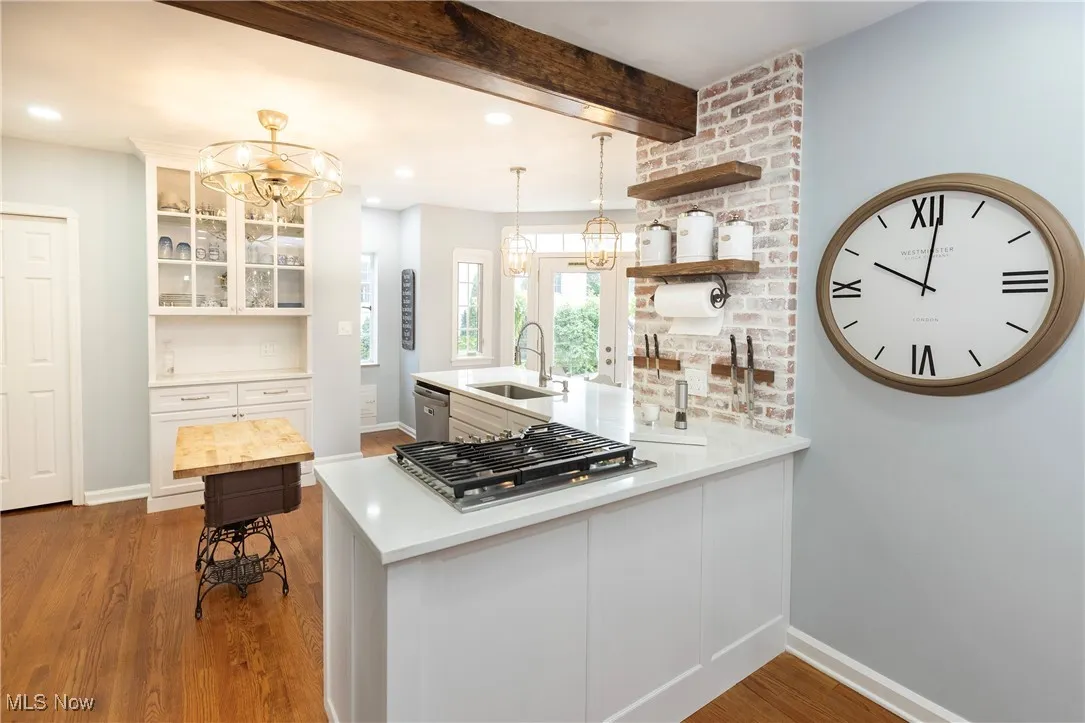 This spectacular kitchen is the hub of the home where you will find a place to enjoy upgraded stainless appliances, quartz counters, breakfast bar and pantry!