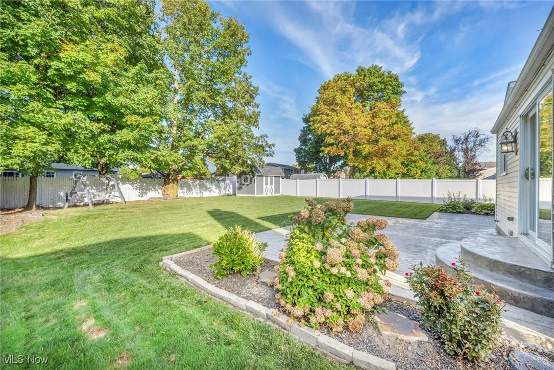 View of fenced backyard