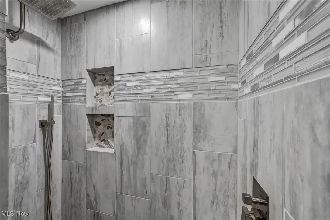 Bathroom view of tiled shower