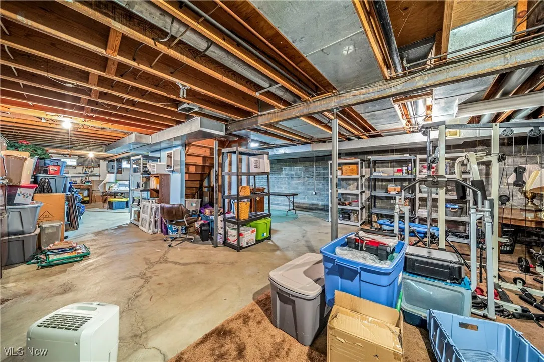 Unfinished basement with stairs