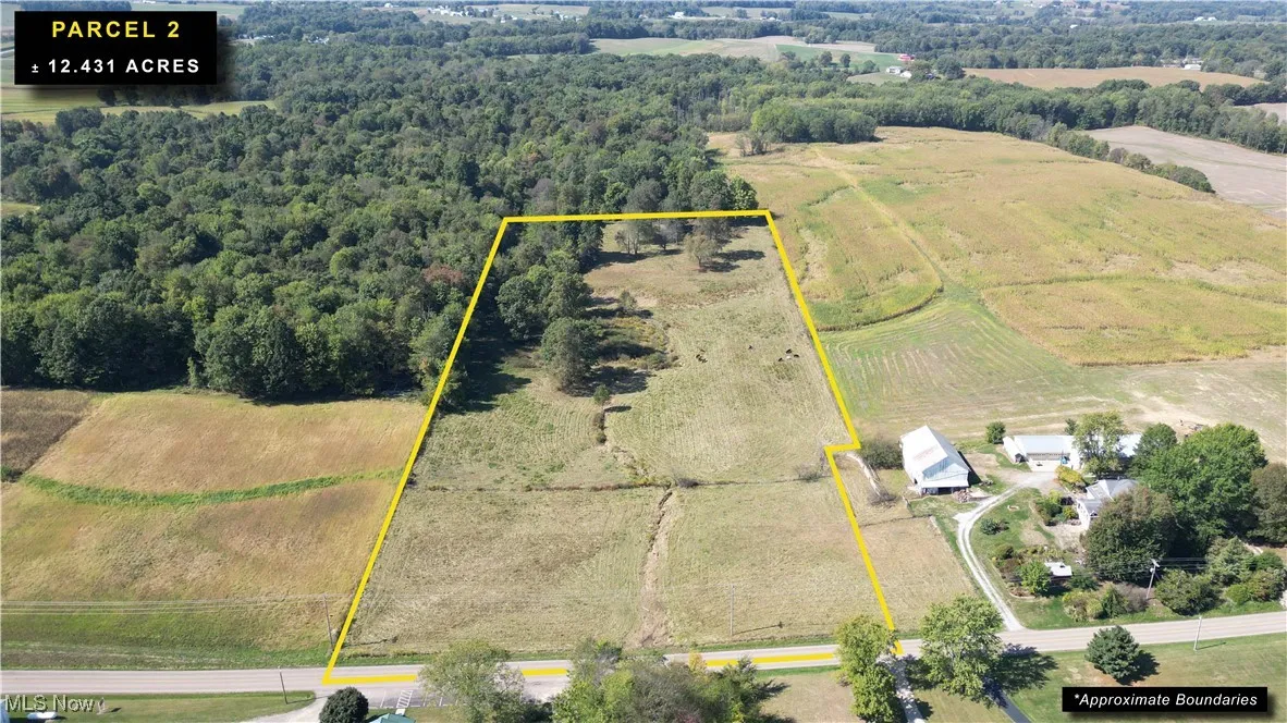 Overview of rural landscape with property boundaries highlighted and rows of crops