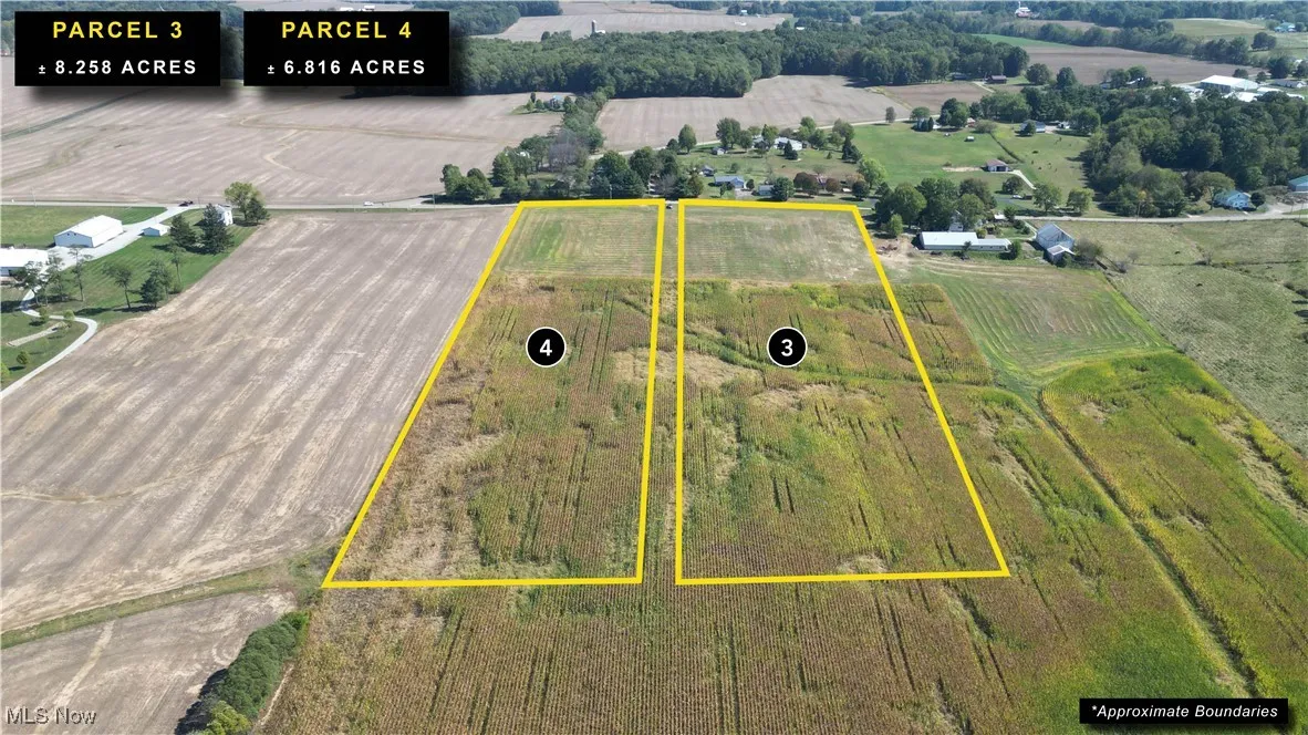 Aerial view of sparsely populated area featuring large plots for crops and property boundaries highlighted