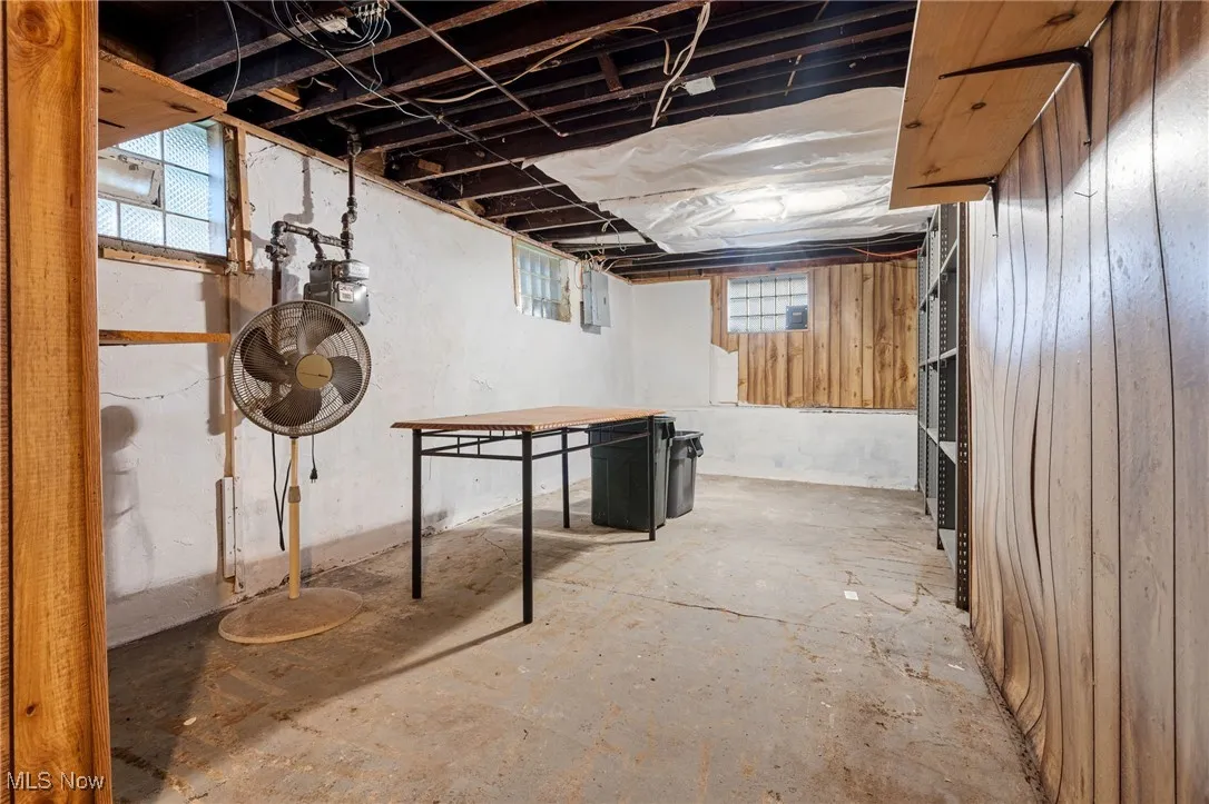 Below grade area featuring electric panel