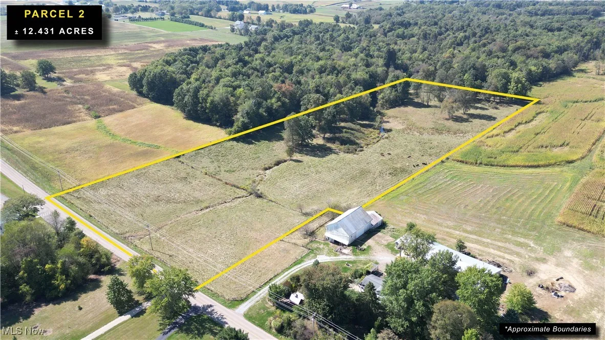 Overview of rural landscape with extensive farmland and property parcel outlined