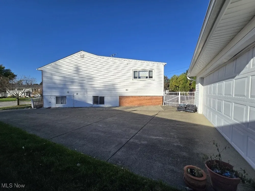 View of side of home.  Lots of room to park in front of your Two (2) Car Garage!