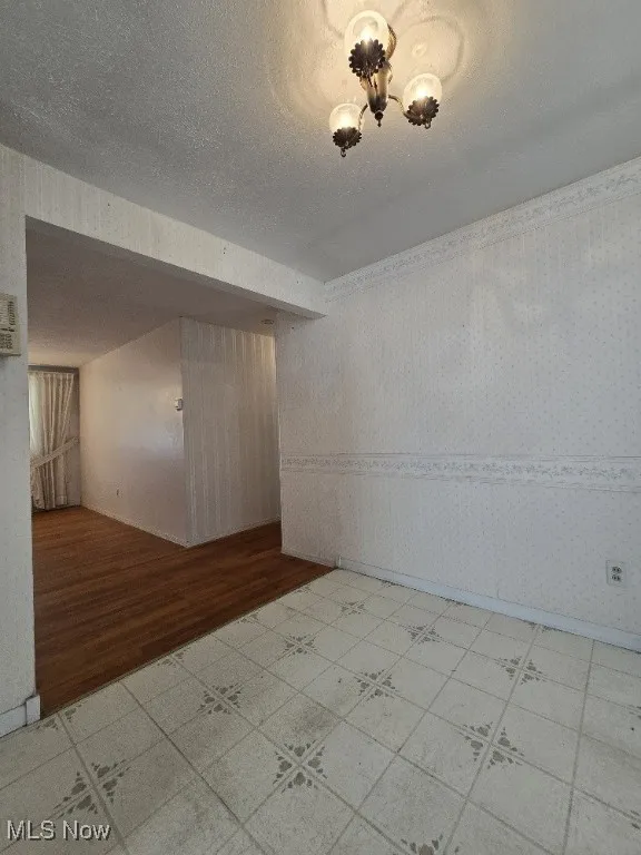 Large Eat-In Kitchen with white appliances, light countertops, decorative backsplash, and Slider to an amazing Back Yard Patio and Fenced Yard!