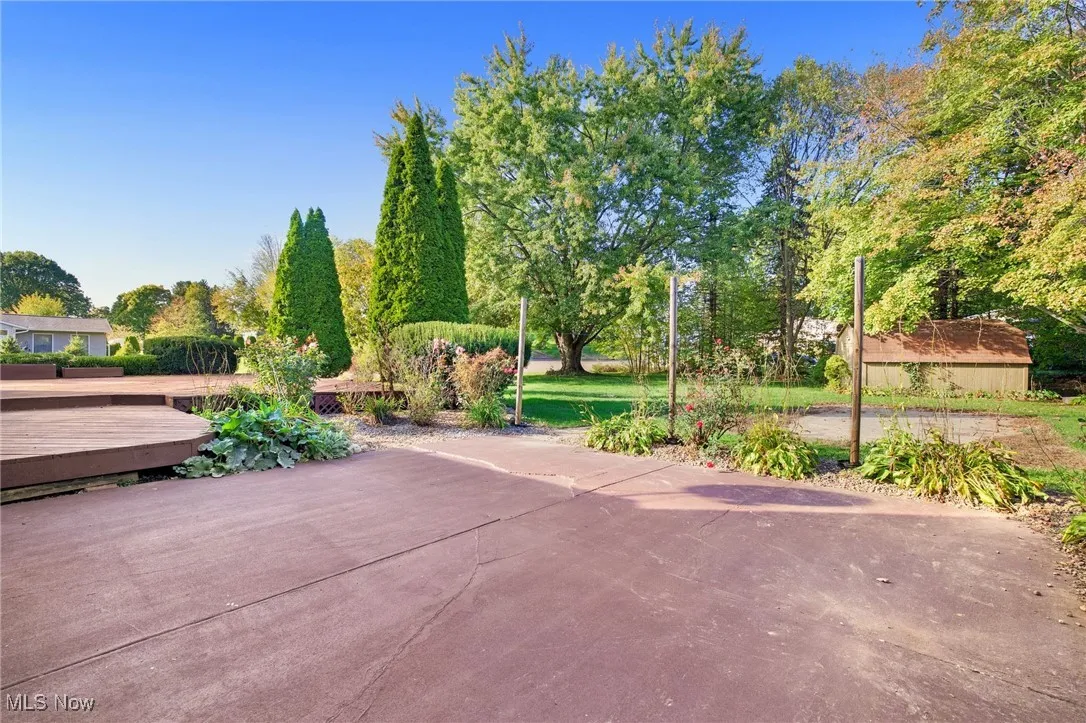 View of patio with view of wooded area