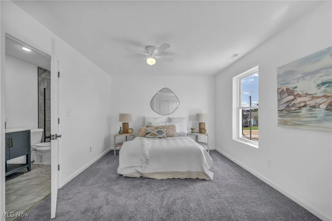 Bedroom featuring carpet flooring and ceiling fan