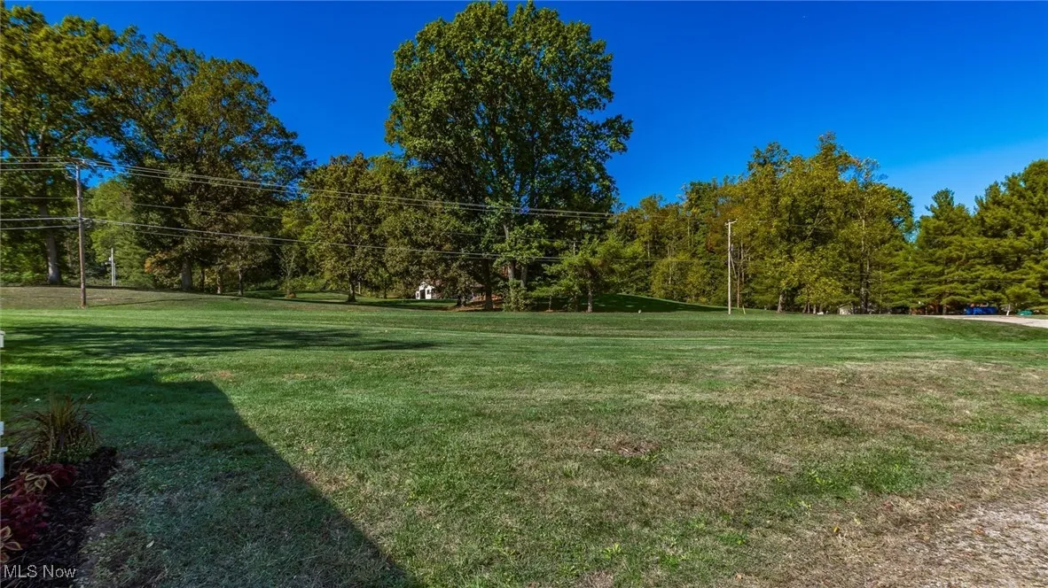 View of home's community featuring a lawn