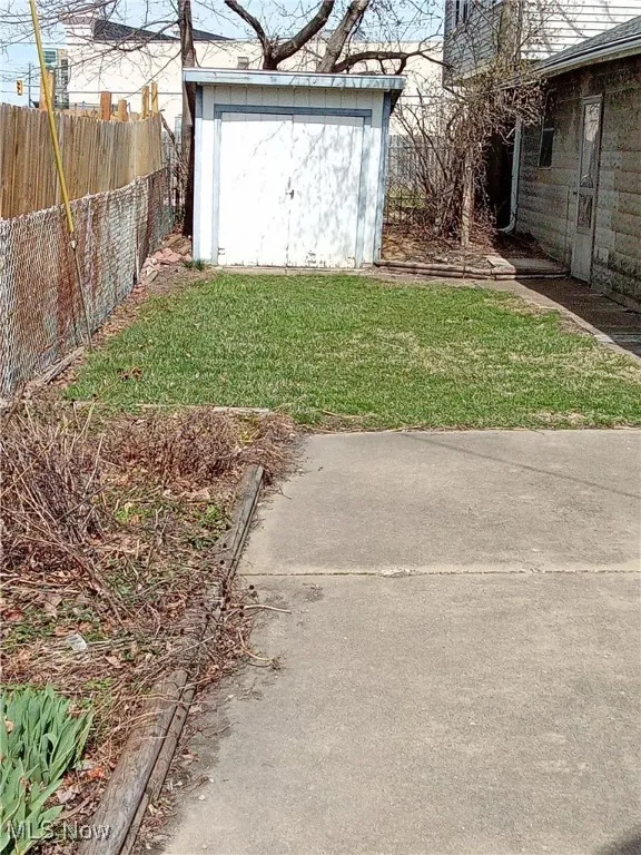 View of yard with a shed