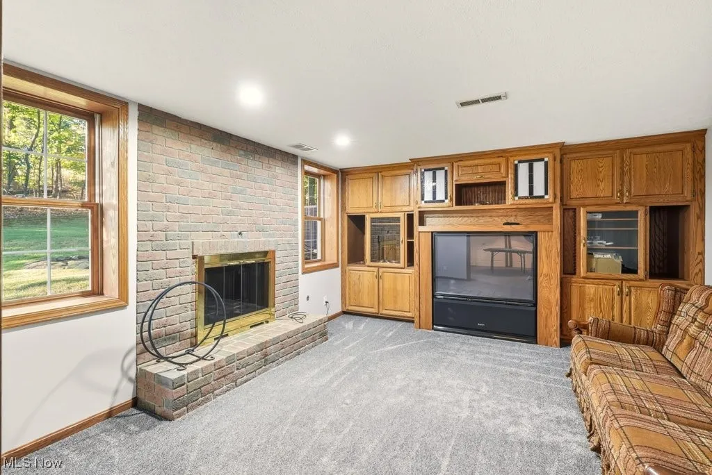 21 x 13 Rec Room with Fireplace, Half Bath, and Separate Living Space