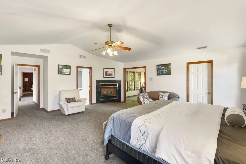 Master Bedroom with Fireplace, Two Extra Large Walk-in Closets, and Large 12 x 14 Sitting Area