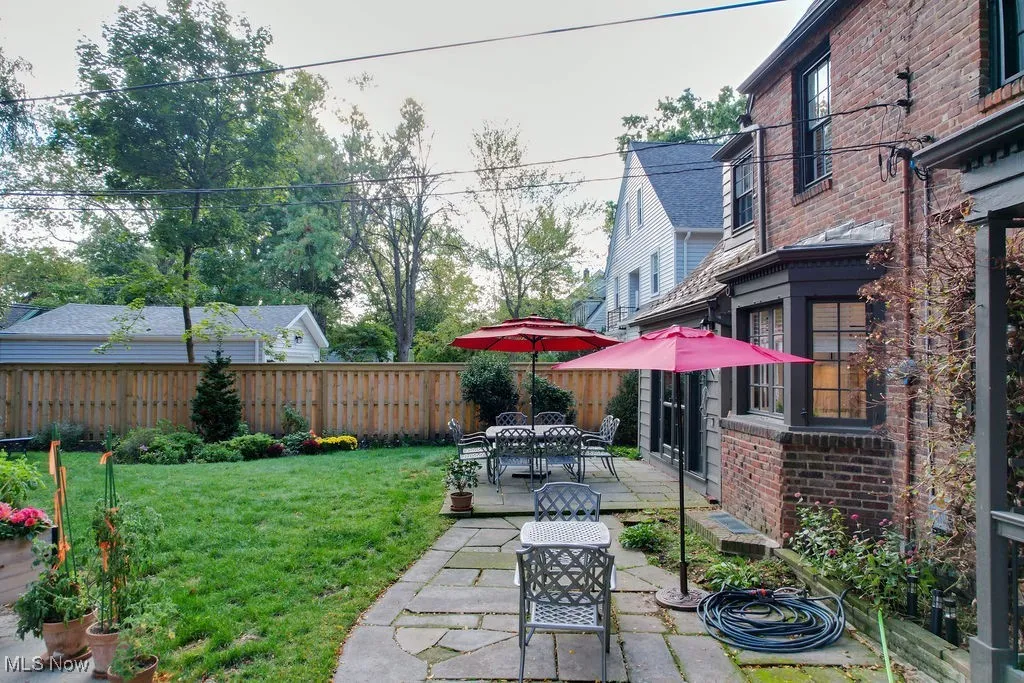 Fenced backyard featuring a patio