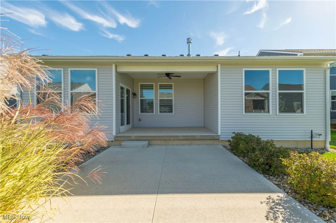 Property entrance featuring ceiling fan