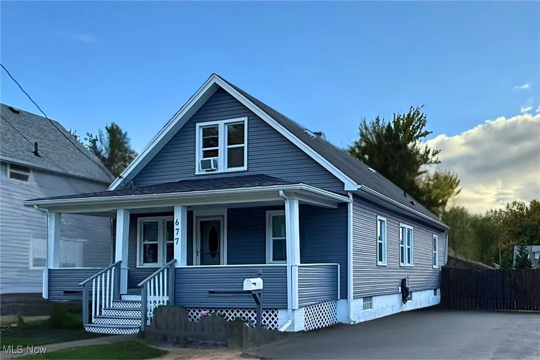 Bungalow-style home with covered porch