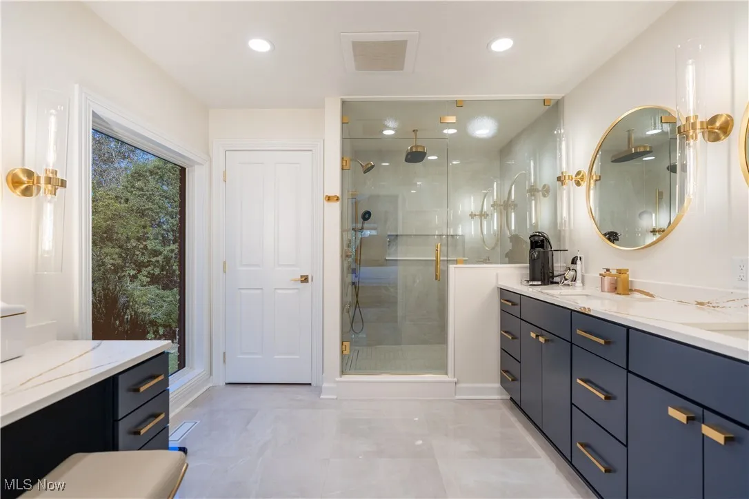 Natural lighting and a separate make up station in the master bathroom.