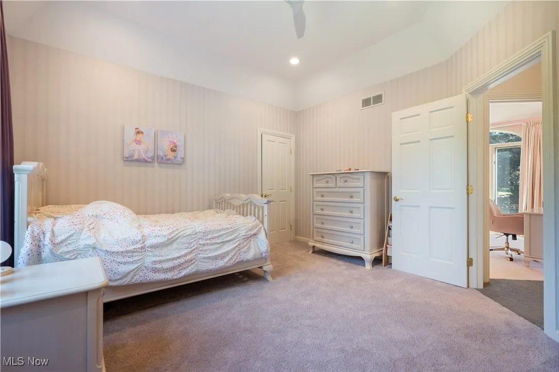 Bedroom 4 of 5 with recessed lighting and a ceiling fan.