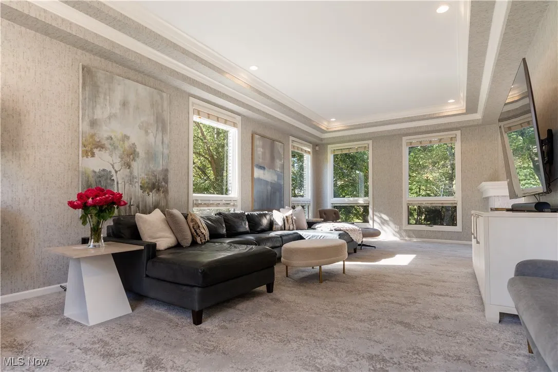 Natural light flows dramatically through the home.