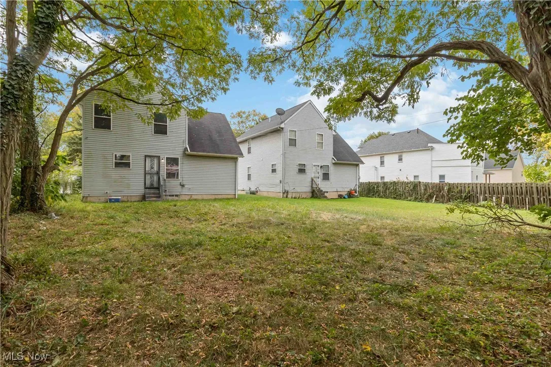 Back of property featuring entry steps