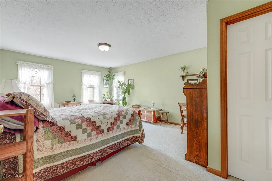 Primary bedroom with its own full bath and a large walk-in closet
