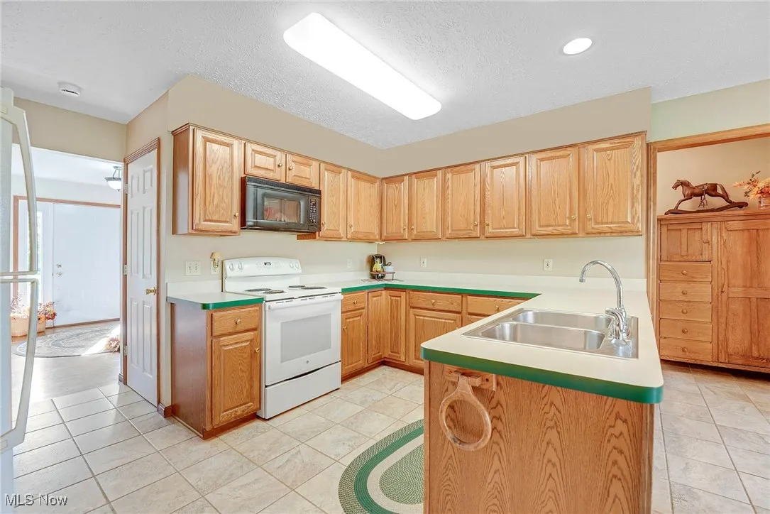 Spacious kitchen with plenty of counter space and a separate eating area