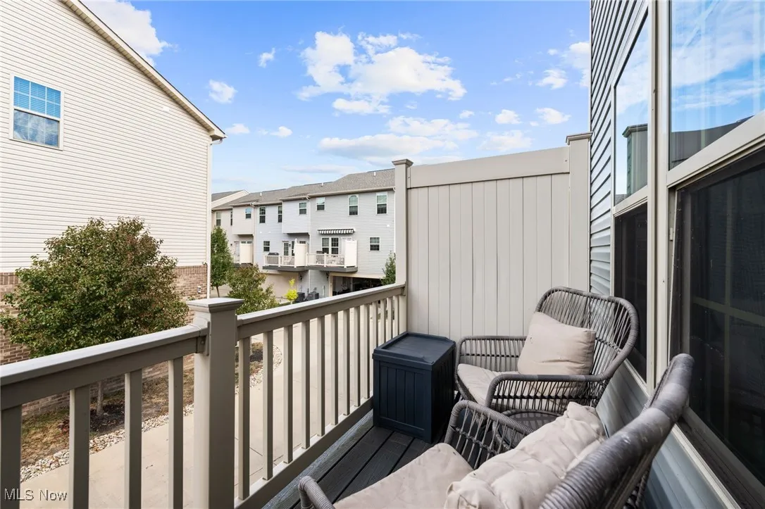 Balcony featuring a residential view
