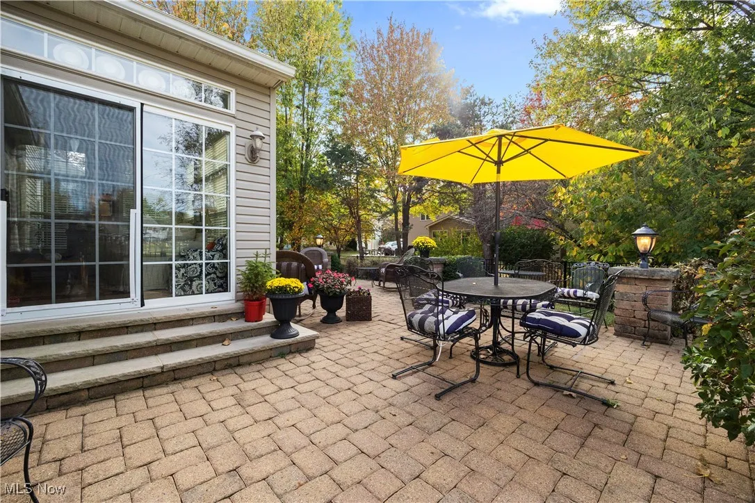 View of patio featuring outdoor dining area