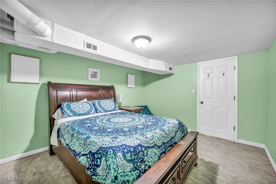 Bedroom featuring baseboards