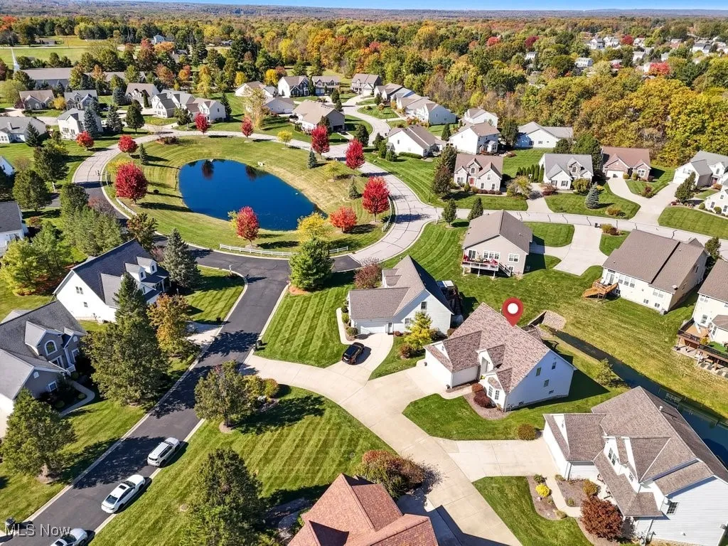 Aerial view of residential area with a large body of water