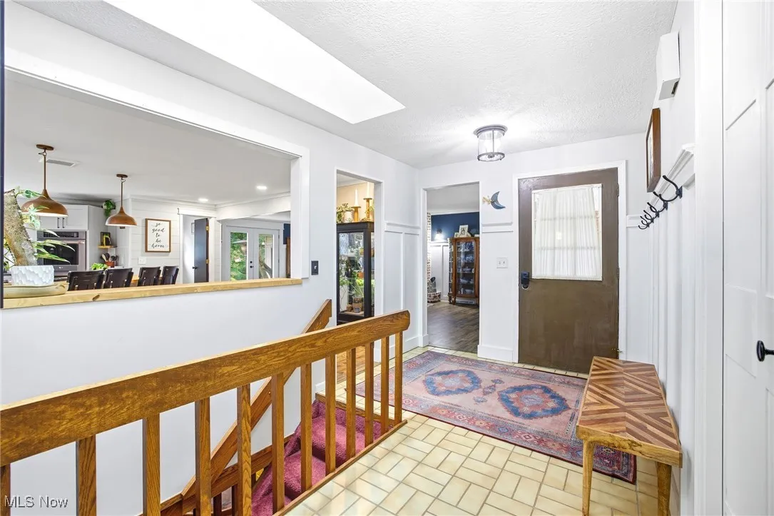 Entryway with tile flooring