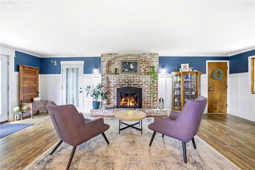 Family room area featuring the fireplace and LVT flooring