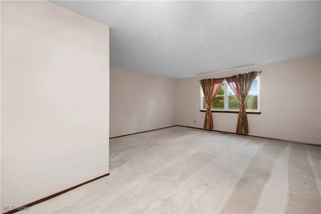 Living room loads of natural light and plenty of space to live in