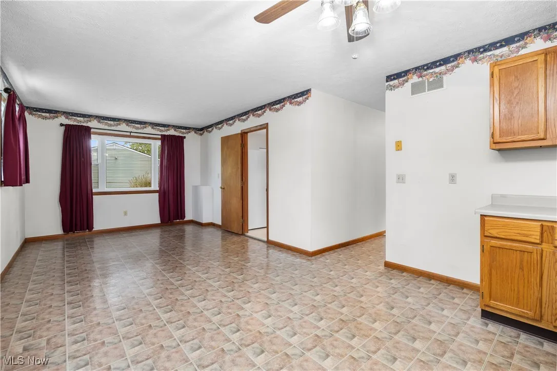 This room could be used a s a formal dining, family room, recreational room lots of opportunity for this room, is off kitchen in front part of the home
