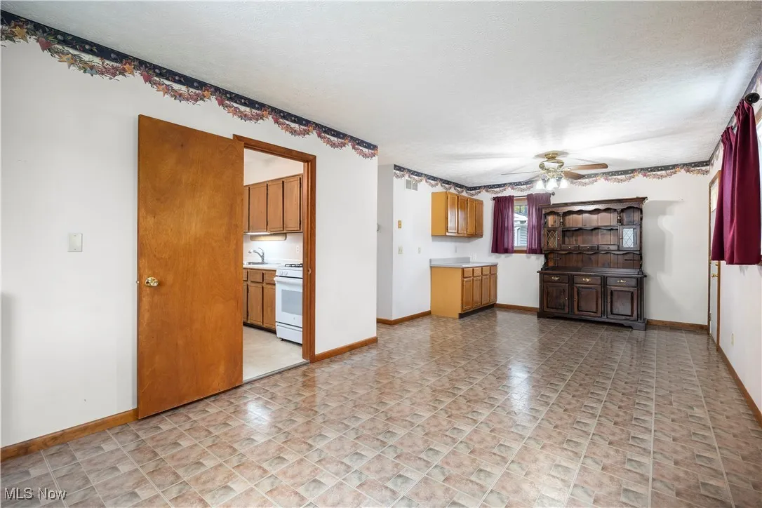 This room could be used a s a formal dining, family room, recreational room lots of opportunity for this room, is off kitchen in front part of the home