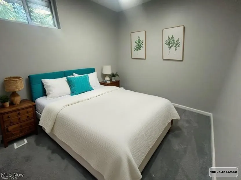 Bedroom featuring carpet floors