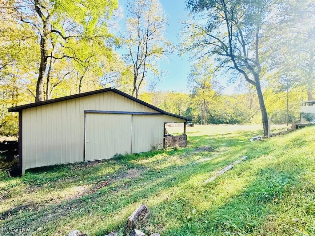 Pole barn across the road on creek side