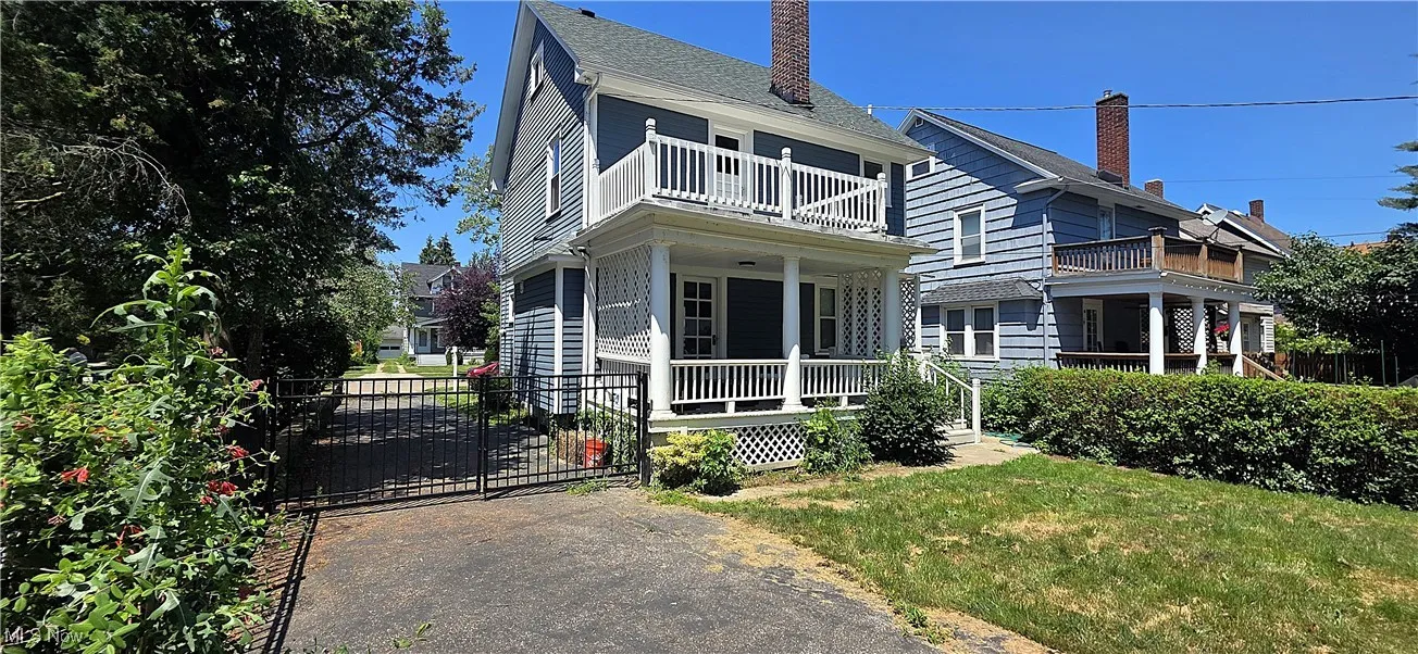 Enjoy the view of the fenced-in backyard from covered porch and balcony.