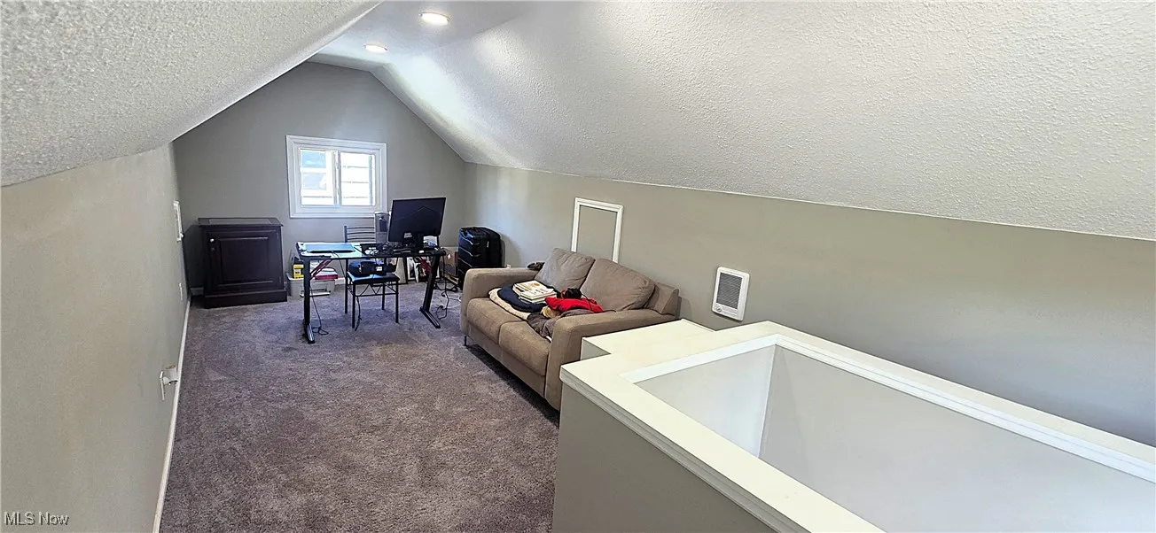 Spacious 3rd-floor area, offering potential as a 4th bedroom, office, or additional living space