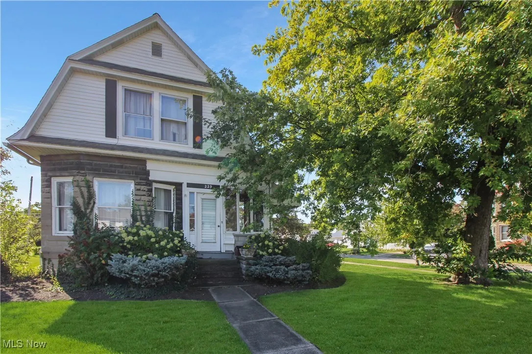 View of front of home with a front yard