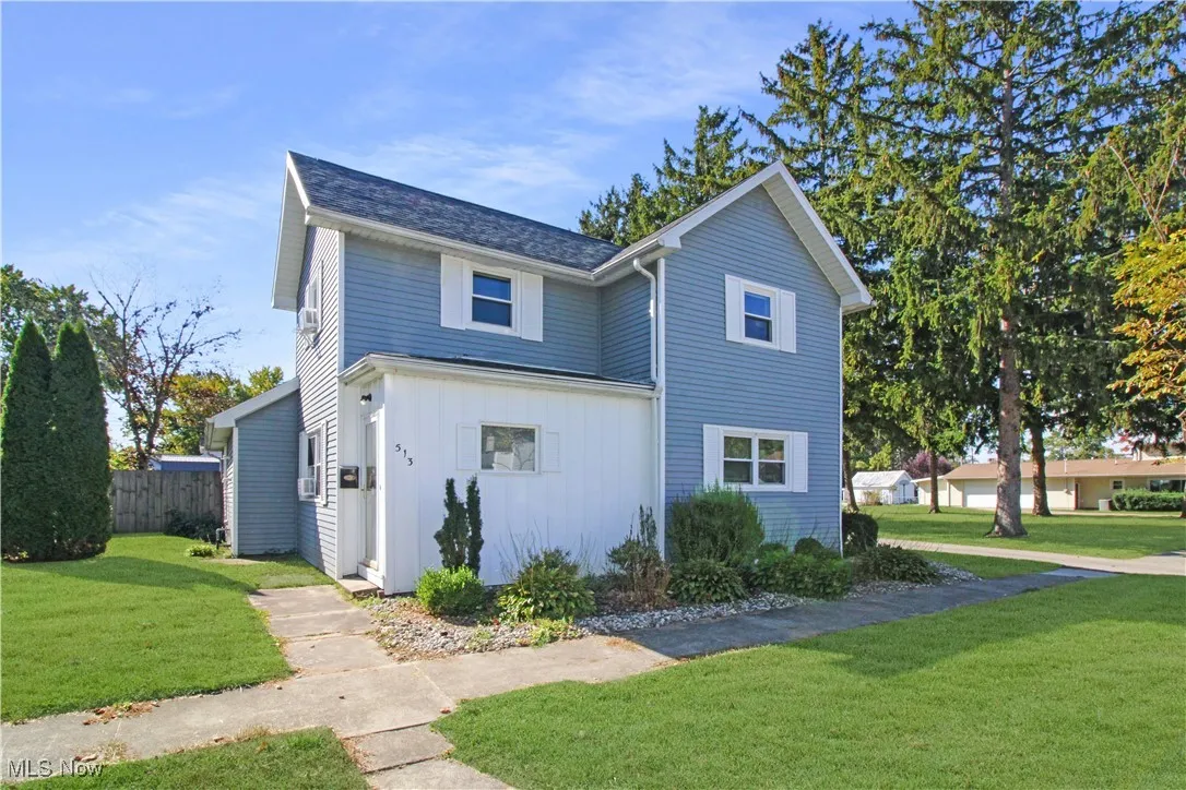 View of front of property with board and batten siding